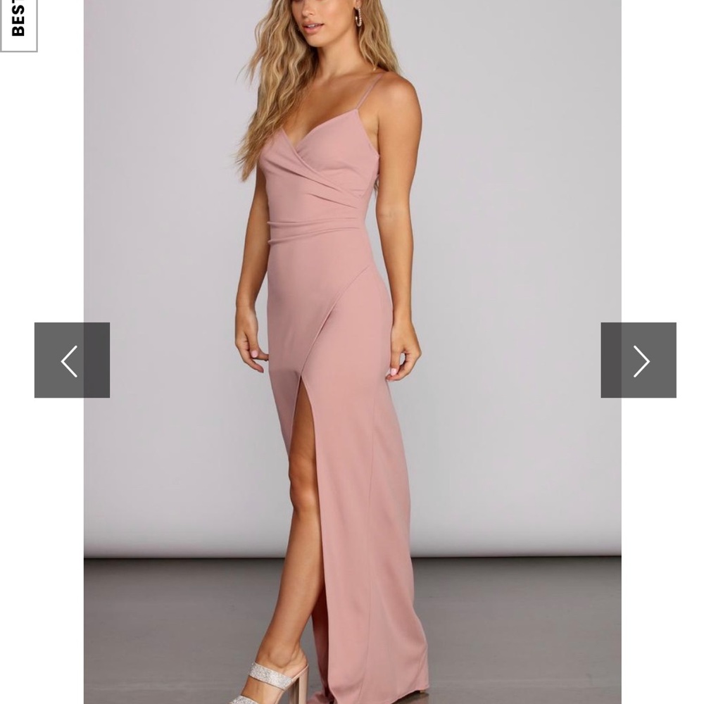 I am selling a never worn Grown Dress from Windsor